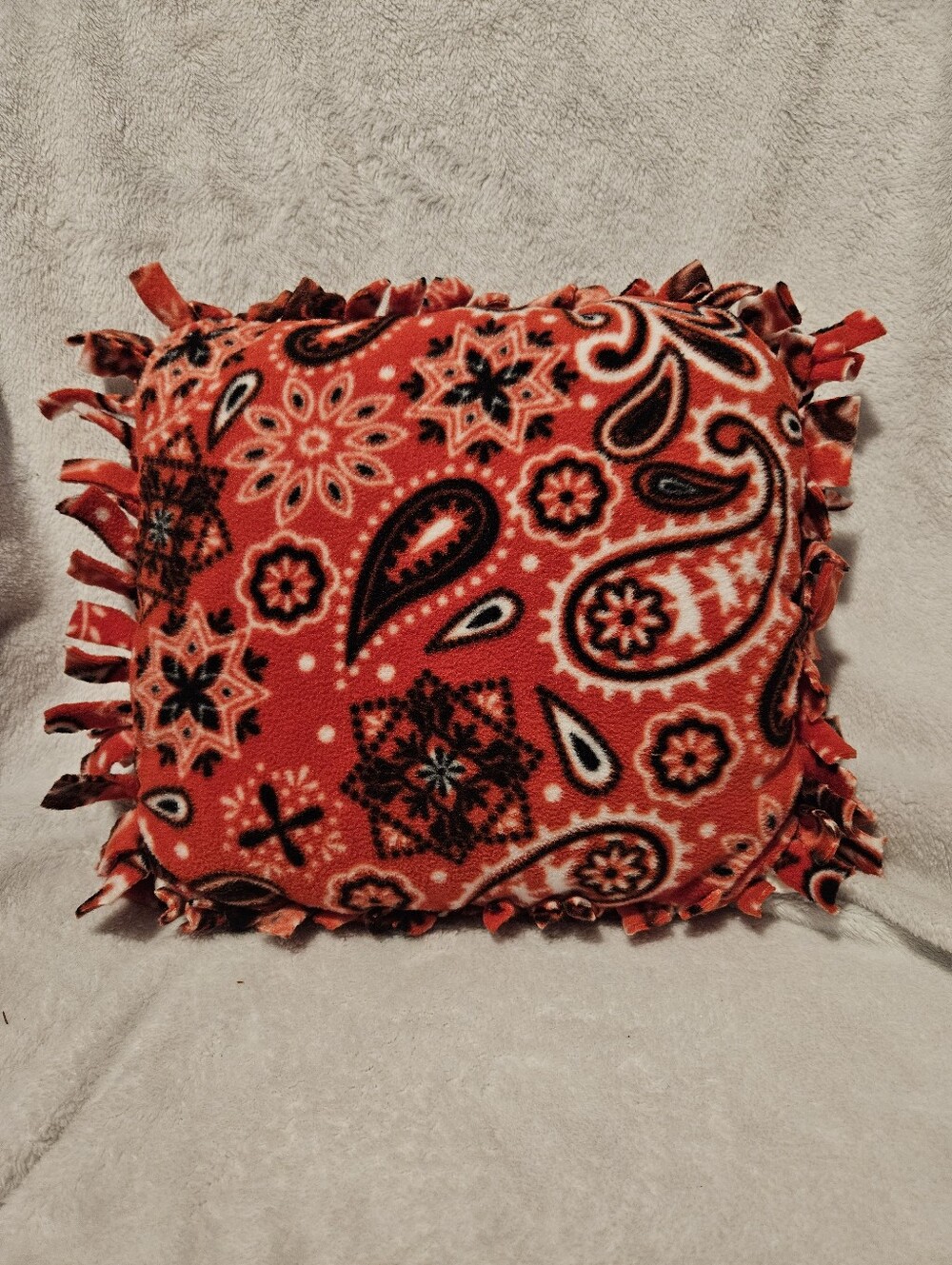 Handmade red bandana print paisley fleece accent pillow.  Machine washable,